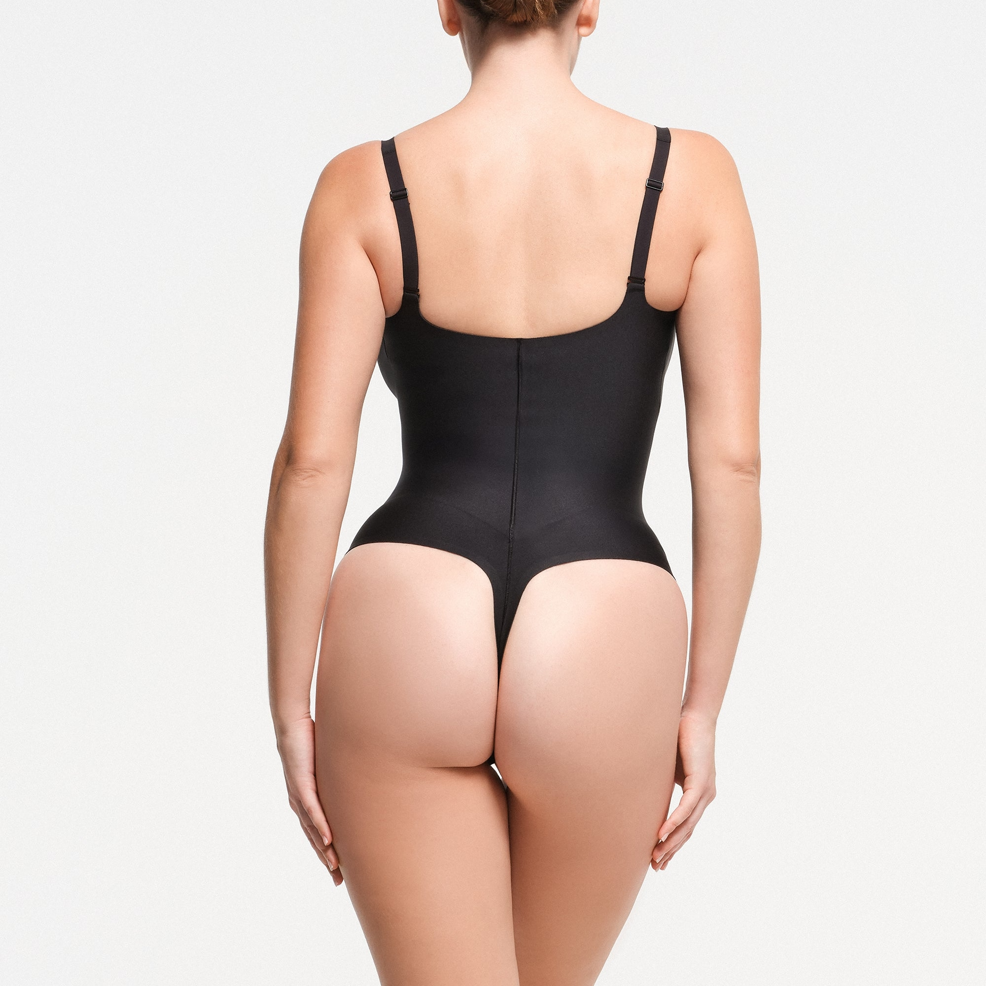 CORE SCULPT PLUNGE THONG BODYSUIT